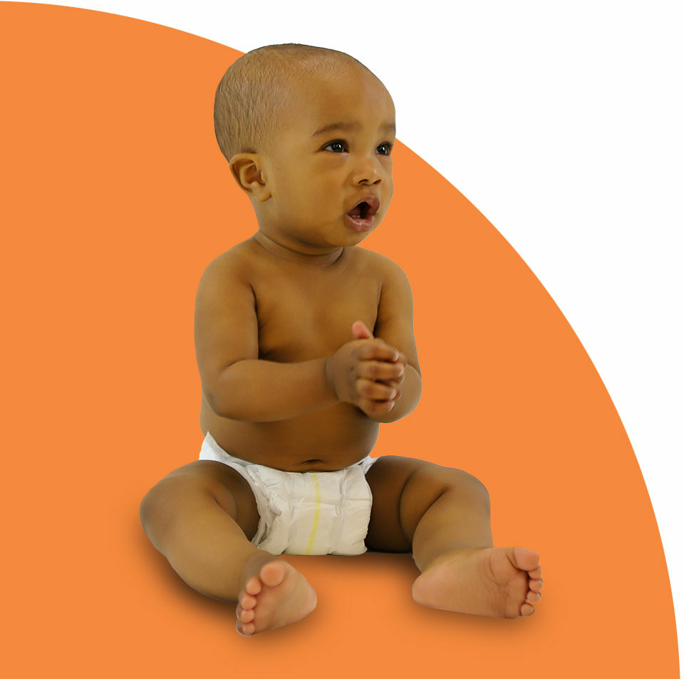 Baby in diaper clasping hands